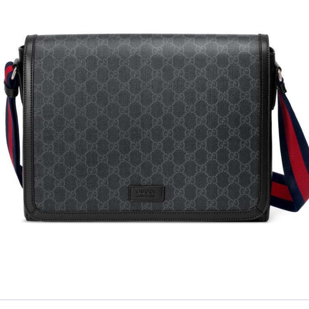 Black Gucci Supreme Messenger bag